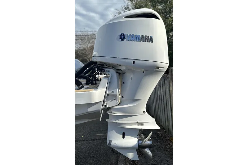 Slide: The Image of 2018 Regulator 34 Center Console with Yamaha outboard motor, side view. - 4