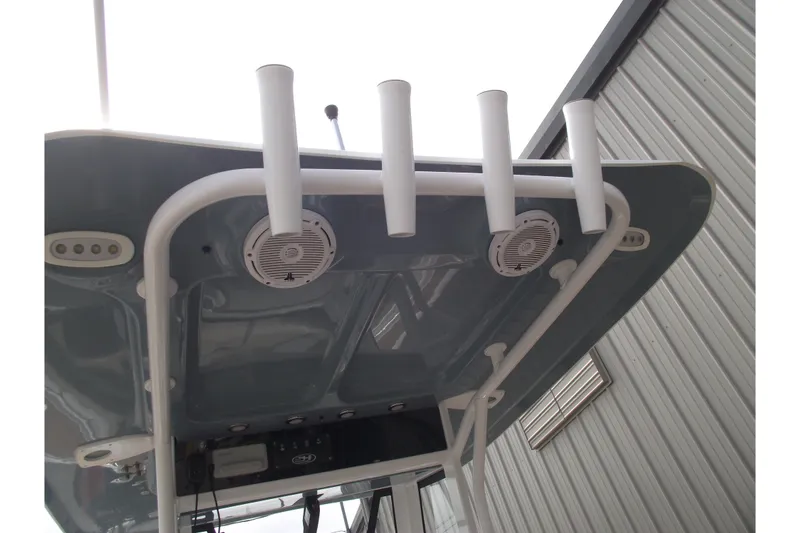 Slide: The Image of 2023 Sea Hunt Ultra 265 SE boat roof with rod holders and speakers. - 25