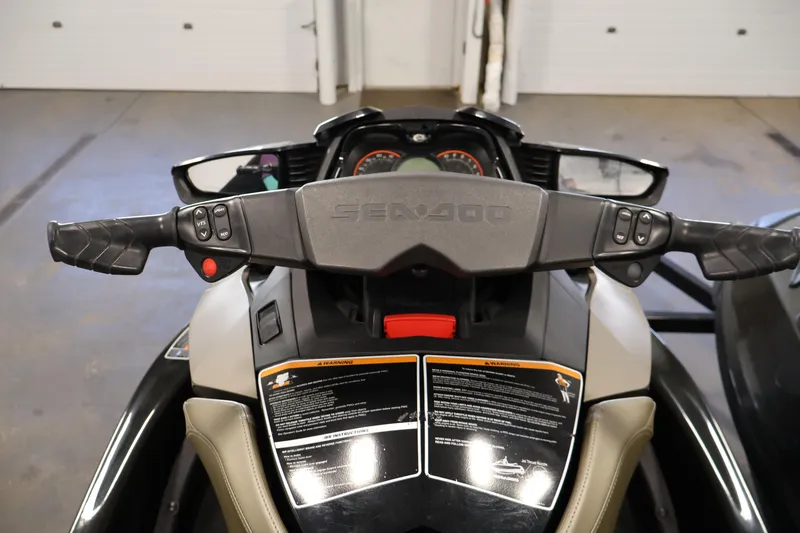Slide: The Image of 2017 Sea-Doo GTX Limited S 260 handlebars and dashboard in a garage setting. - 12