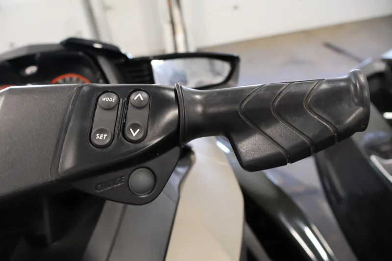 Slide: The Image of 2017 Sea-Doo GTX Limited S 260 handlebar controls with mode and set buttons. - 14