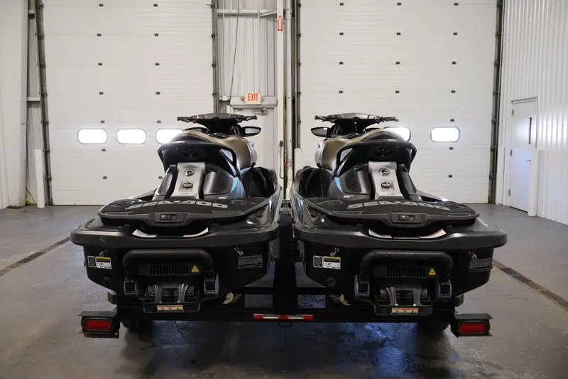 Slide: The Image of 2017 Sea-Doo GTX Limited S 260 jet skis on trailer in garage. - 6