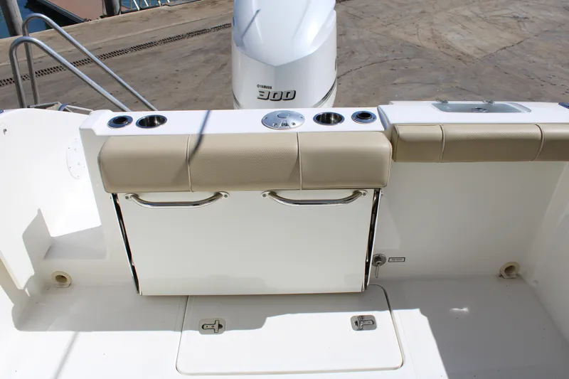 Slide: The Image of 2020 Pursuit DC 235 Dual Console boat with Yamaha 300 engine, featuring a sleek deck design. - 15
