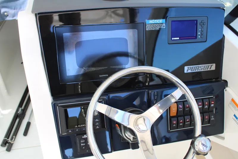 Slide: The Image of 2020 Pursuit DC 235 Dual Console interior with closed cabin door. - 26