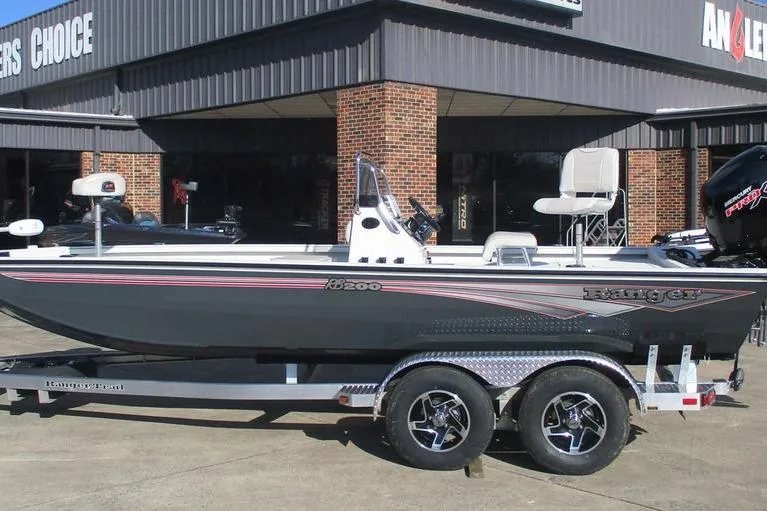 The Image of 2026 Ranger RB200 boat on trailer outside dealership. - 1