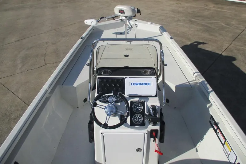 Slide: The Image of 2026 Ranger RB200 boat interior with steering console and Lowrance equipment. - 7
