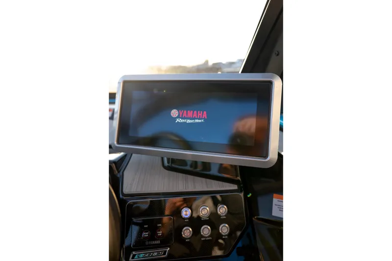 Slide: The Image of Dashboard of 2023 Yamaha Boats 222XD with touchscreen display and controls. - 10