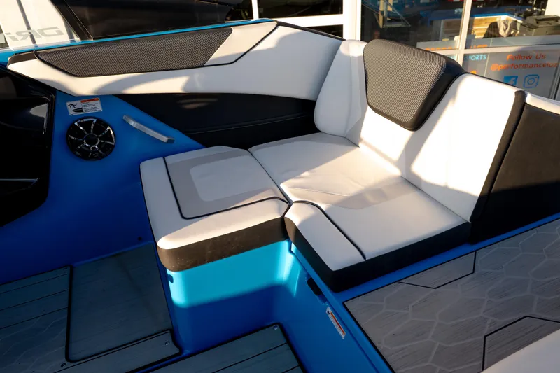 Slide: The Image of 2023 Yamaha Boats 222XD interior seating with modern design and comfortable upholstery. - 22
