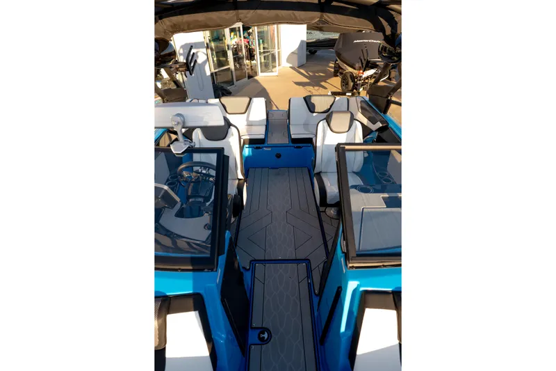 Slide: The Image of 2023 Yamaha Boats 222XD interior with modern seating and sleek design. - 23
