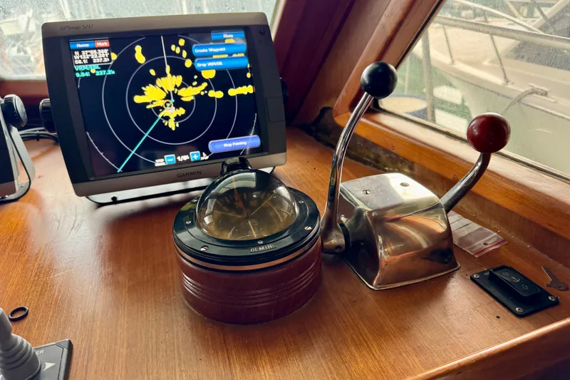 Slide: The Image of 1982 Tung Hwa Seahorse boat cockpit with navigation equipment and controls. - 21