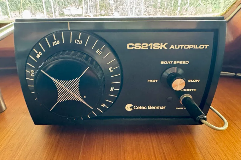 Slide: The Image of 1982 Tung Hwa Seahorse CS21SK autopilot control panel on wooden surface. - 23