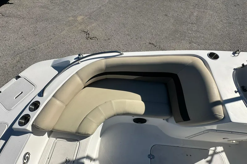 Slide: The Image of 2019 Hurricane SunDeck Sport 188 OB boat interior with beige seating. - 11