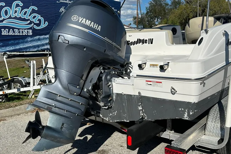 Slide: The Image of 2019 Hurricane SunDeck Sport 188 OB boat with Yamaha outboard motor on trailer. - 26