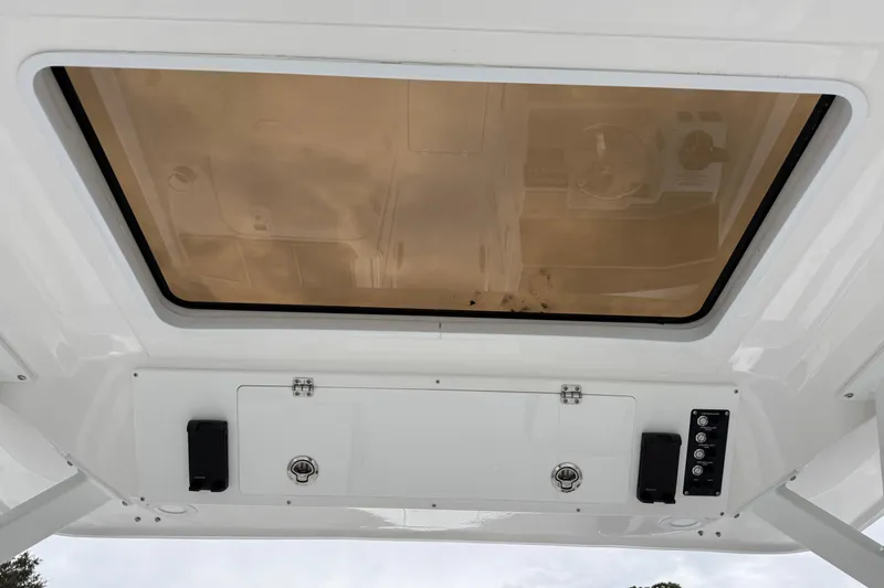 Slide: The Image of 2026 Sea Fox 268 Traveler boat interior roof with hatch and control panel. - 14