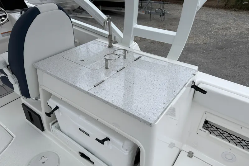 Slide: The Image of 2026 Sea Fox 268 Traveler boat interior with sink and storage area. - 21