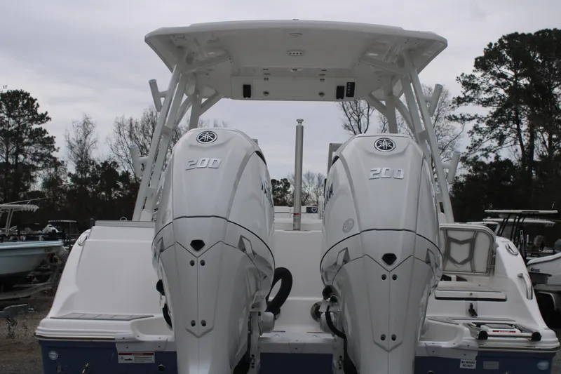 Slide: The Image of 2026 Sea Fox 268 Traveler with dual Yamaha 200 engines, rear view. - 4