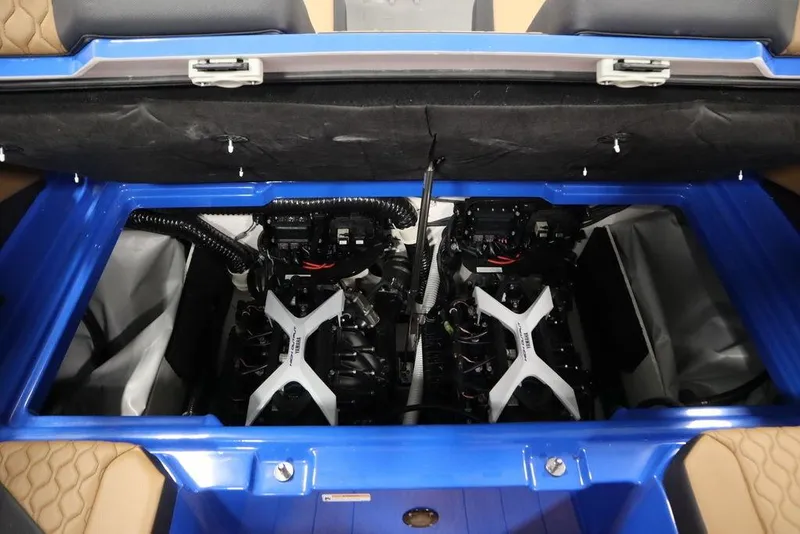 Slide: The Image of 2024 Yamaha Boats 222XE engine compartment showcasing dual engines and sleek design. - 44