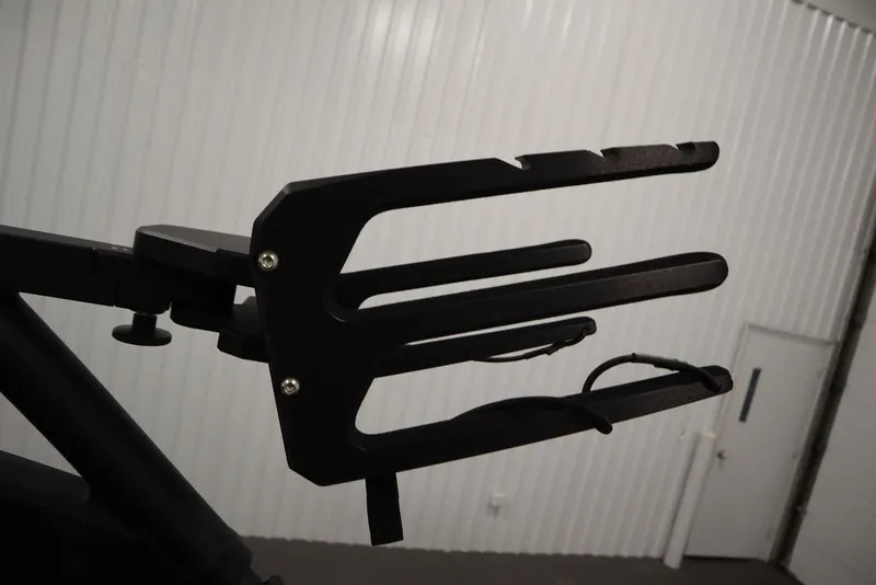 Slide: The Image of 2024 Yamaha Boats 222XE wakeboard rack in a storage facility. - 47