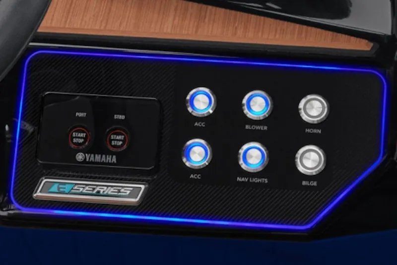 Slide: The Image of Control panel of 2024 Yamaha Boats 222XE with illuminated buttons and E-Series branding. - 62