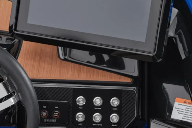 Slide: The Image of 2024 Yamaha Boats 222XE dashboard with touchscreen and control panel. - 63