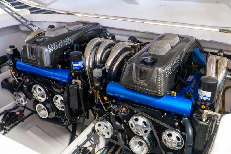 Slide: The Image of Twin Mercury Racing 565 engines in a 2019 Cigarette 41' Nighthawk SD Edition boat. - 2