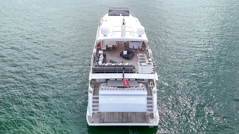 Slide: The Image of Aerial view of 2017 Azimut 95 Raised Pilothouse yacht on open water. - 23
