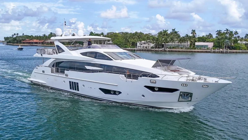Slide: The Image of 2017 Azimut 95 Raised Pilothouse yacht cruising on a sunny day. - 31