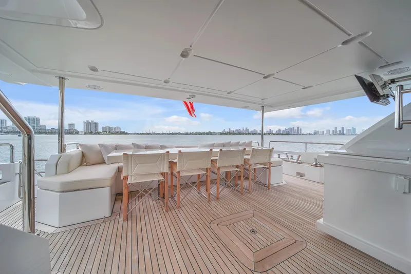 Slide: The Image of Luxurious 2017 Azimut 95 Raised Pilothouse yacht deck with seating and ocean view. - 36