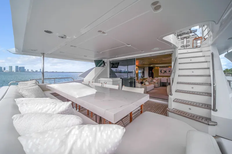 Slide: The Image of Luxurious 2017 Azimut 95 yacht deck with elegant seating and ocean view. - 39