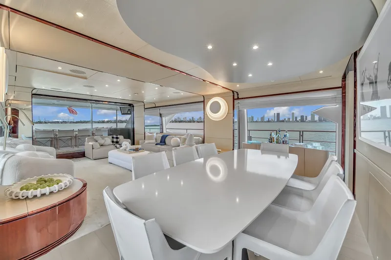 Slide: The Image of Luxurious interior of 2017 Azimut 95 Raised Pilothouse yacht with elegant dining area. - 45