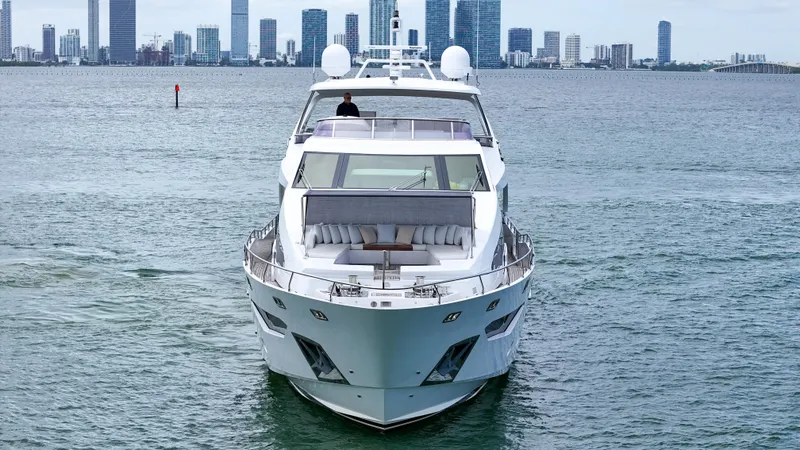 Slide: The Image of Luxurious 2017 Azimut 95 Raised Pilothouse yacht cruising near city skyline. - 7