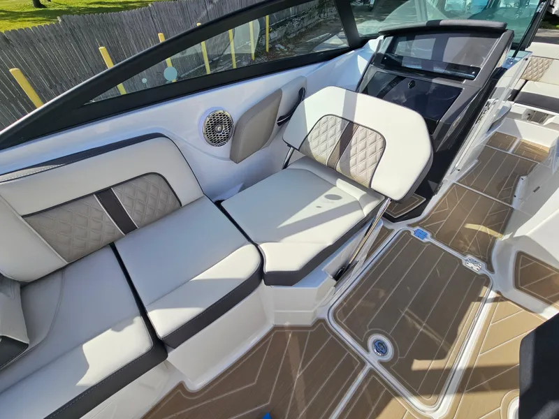 Slide: The Image of 2025 Monterey M-65 boat interior with luxurious seating and modern design. - 21
