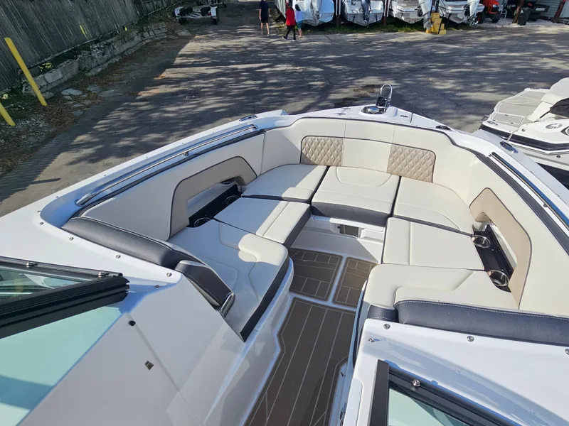 Slide: The Image of Luxurious seating area on a 2025 Monterey M-65 boat, featuring elegant upholstery and spacious design. - 33