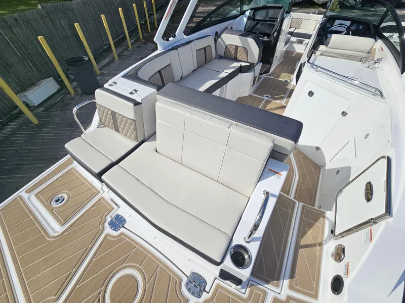 Slide: The Image of 2025 Monterey M-65 boat interior with luxurious seating and modern design. - 9