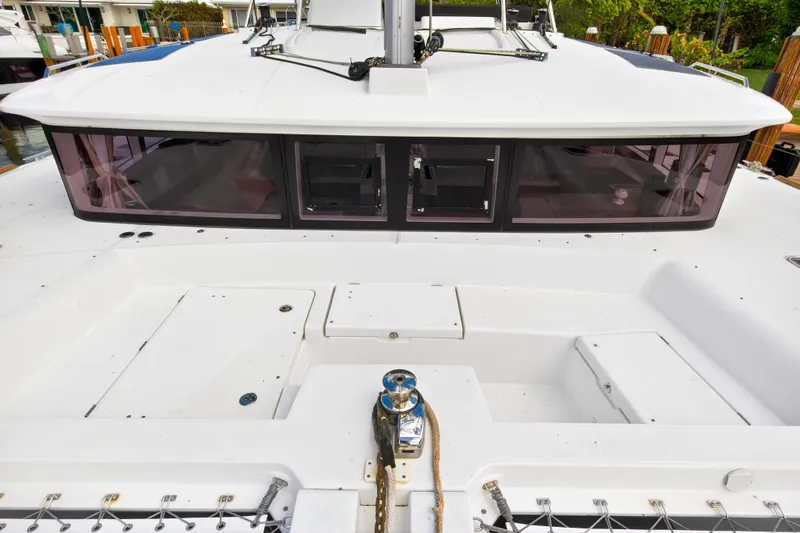 Slide: The Image of 2019 Lagoon 450 F catamaran deck with sleek design and spacious layout. - 25
