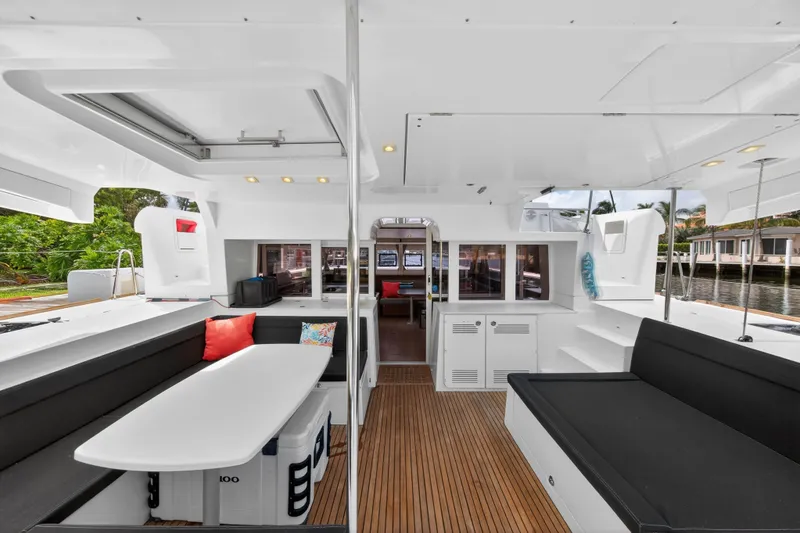 Slide: The Image of 2019 Lagoon 450 F catamaran interior with spacious seating and modern design. - 36