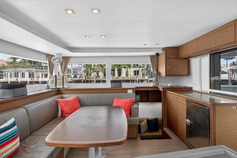 Slide: The Image of Luxurious interior of 2019 Lagoon 450 F catamaran with modern seating and cabinetry. - 59