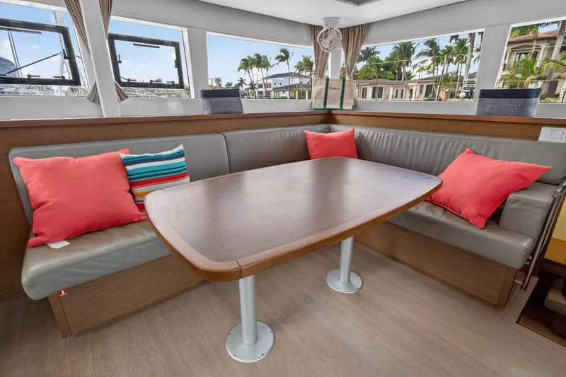 Slide: The Image of Interior of 2019 Lagoon 450 F yacht with cozy seating and colorful cushions. - 61
