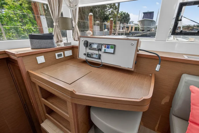 Slide: The Image of Interior of 2019 Lagoon 450 F yacht with navigation station and modern amenities. - 70
