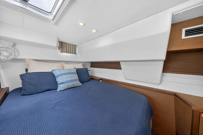 Slide: The Image of Luxurious cabin interior of 2019 Lagoon 450 F yacht with cozy bedding. - 79