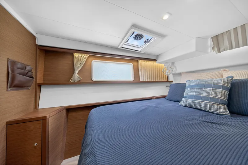 Slide: The Image of Luxurious cabin interior of 2019 Lagoon 450 F yacht with cozy bedding. - 80