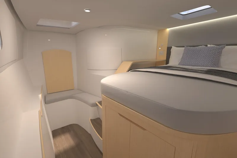 Slide: The Image of Luxurious interior of 2026 Seawind 1270 catamaran with modern bed and seating area. - 32