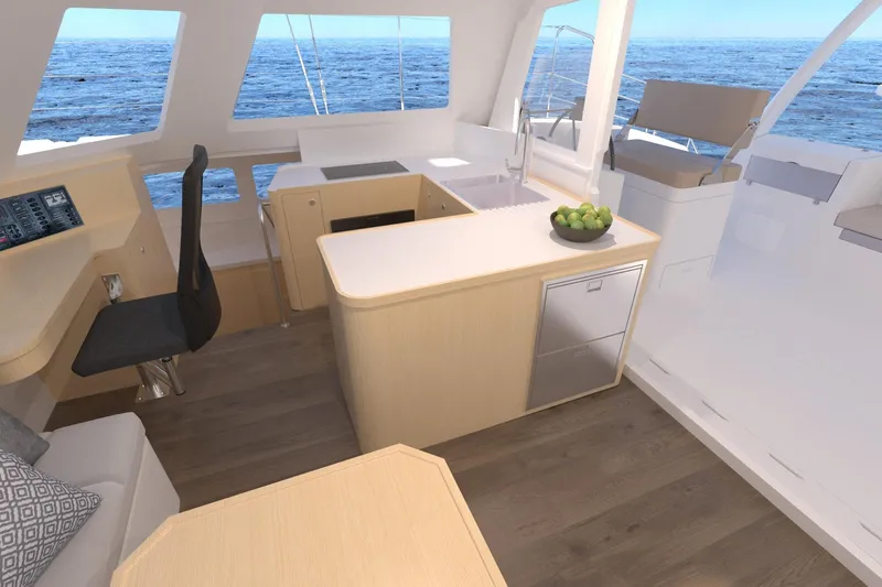 Slide: The Image of Modern interior of 2026 Seawind 1270 catamaran with ocean view, featuring sleek kitchen and seating. - 34