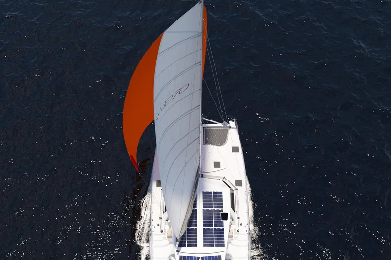Slide: The Image of 2026 Seawind 1270 catamaran sailing with solar panels, aerial view. - 5