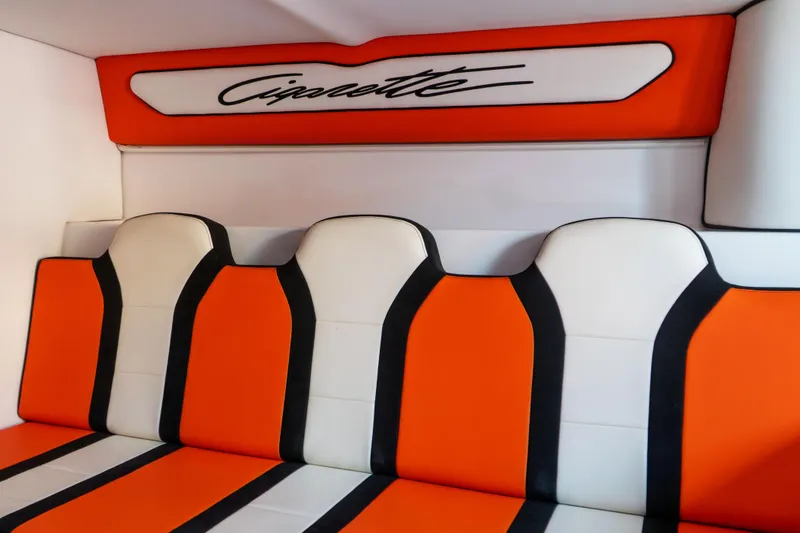 Slide: The Image of Orange and white seating in 2022 Cigarette 515 boat interior. - 4