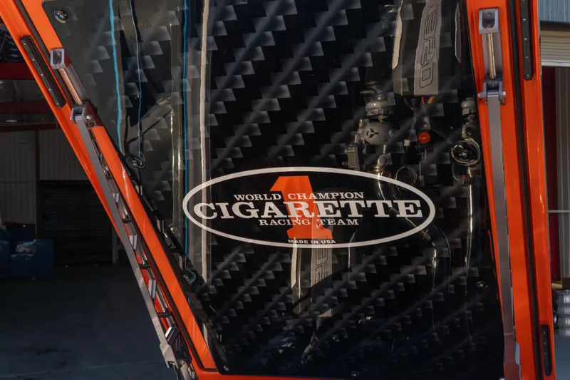 Slide: The Image of 2022 Cigarette 515 boat with World Champion Racing Team logo, carbon fiber detail. - 5