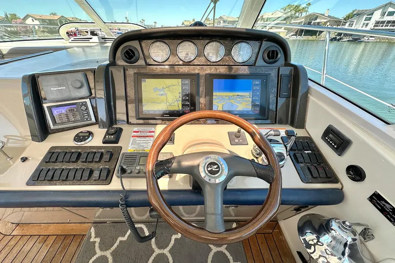 Slide: The Image of 2008 Sea Ray 48 Sundancer yacht helm with modern navigation systems. - 15
