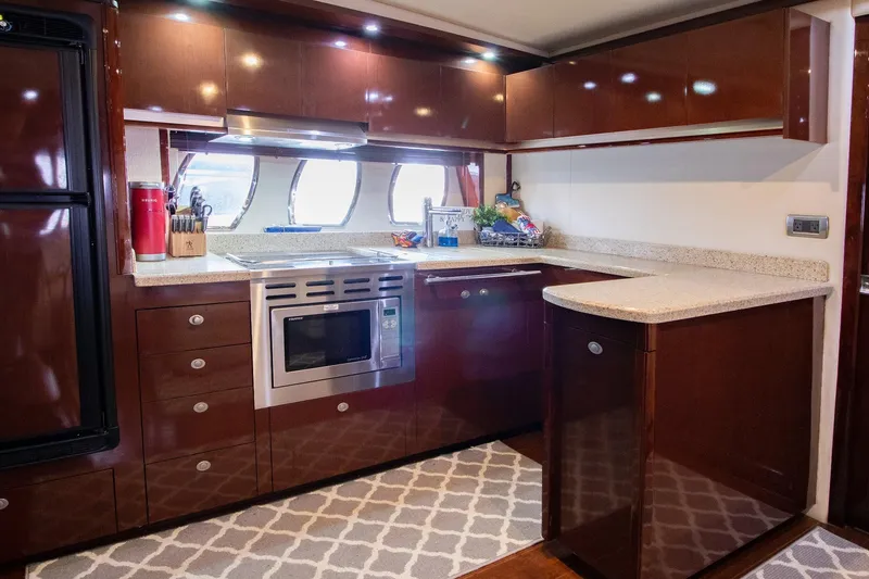 Slide: The Image of Luxurious kitchen in a 2008 Sea Ray 48 Sundancer yacht. - 19