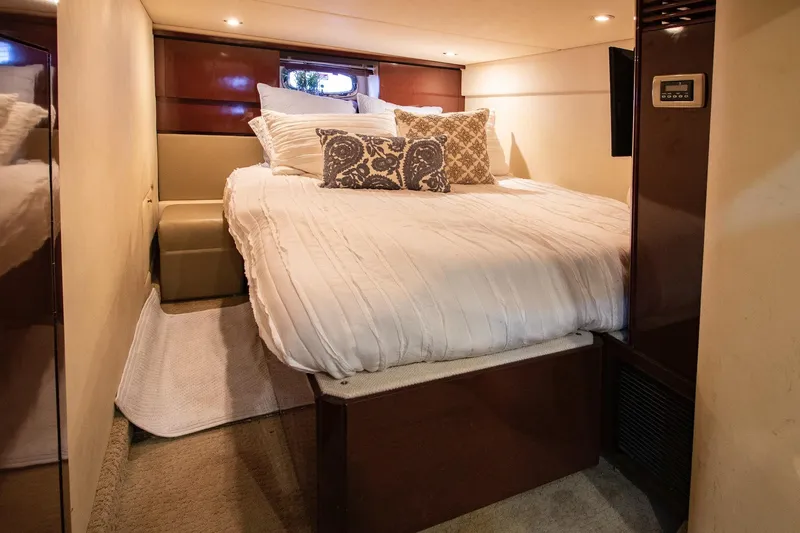 Slide: The Image of Luxurious cabin of 2008 Sea Ray 48 Sundancer with cozy bed. - 23