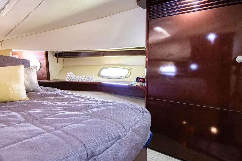 Slide: The Image of Interior of 2008 Sea Ray 48 Sundancer with cozy bed. - 29