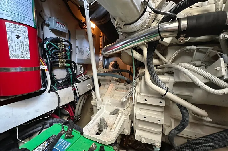 Slide: The Image of Engine room of 2008 Sea Ray 48 Sundancer with wiring and fire extinguisher. - 35